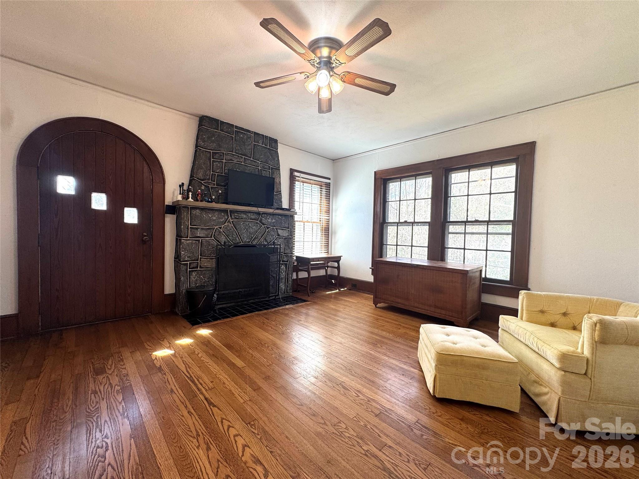 905 Conover Boulevard East Conover, NC 28613 - Photo 7 of 39 a living room with furniture and a fireplace