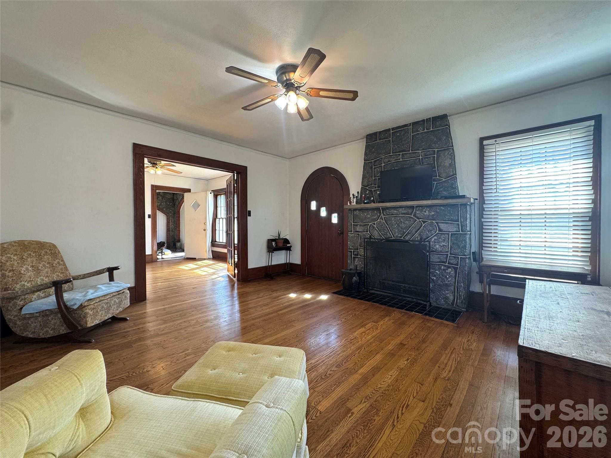 905 Conover Boulevard East Conover, NC 28613 - Photo 8 of 39 a living room with furniture and a fireplace