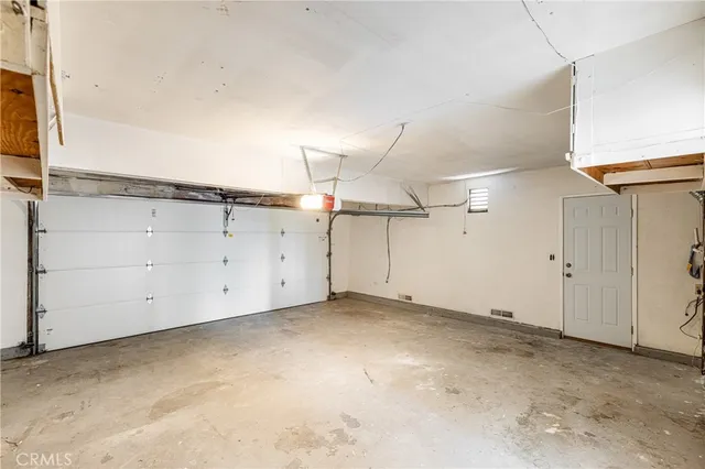 a bathroom with a double vanity sink and mirror with shower
