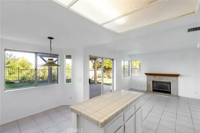 a view of main area window fire place and windows