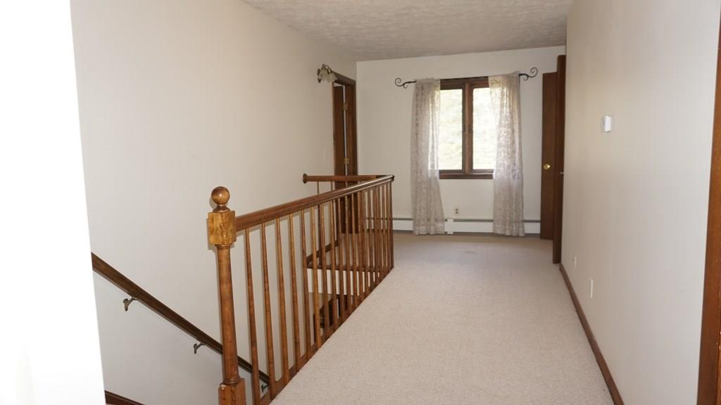 1457 Royalsborough Road Durham, ME 04222 - Photo 14 of 34 Extra wide center hallway of second...