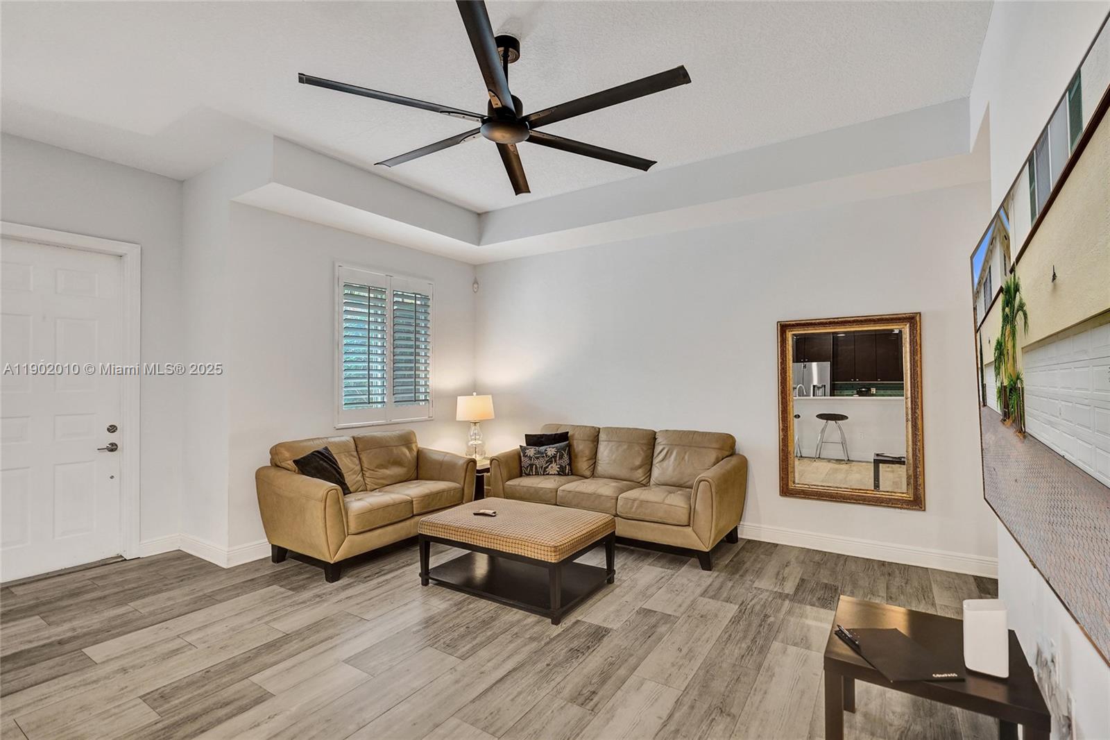 518 North Federal Highway, Unit 14 Lake Worth, FL 33460 - Photo 14 of 54 a living room with furniture and a flat screen tv