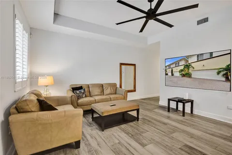 a kitchen with a dining table and chairs