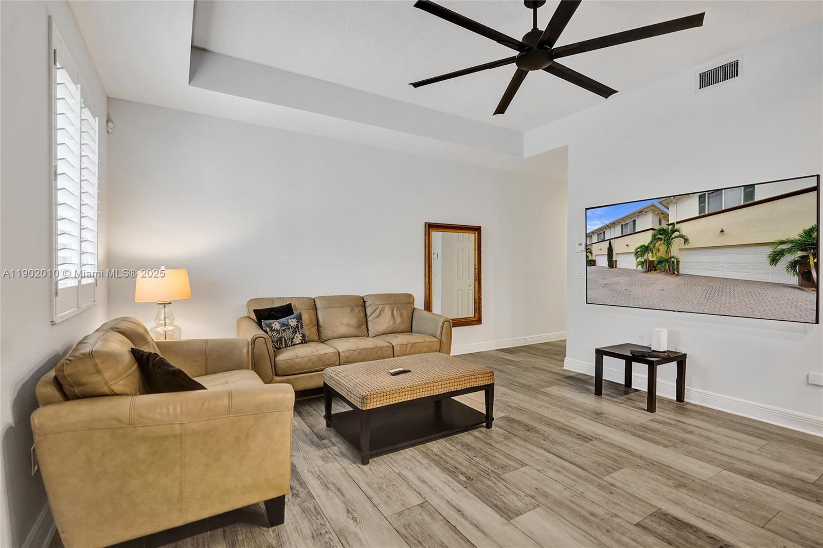 518 North Federal Highway, Unit 14 Lake Worth, FL 33460 - Photo 18 of 54 a living room with furniture and a wooden floor