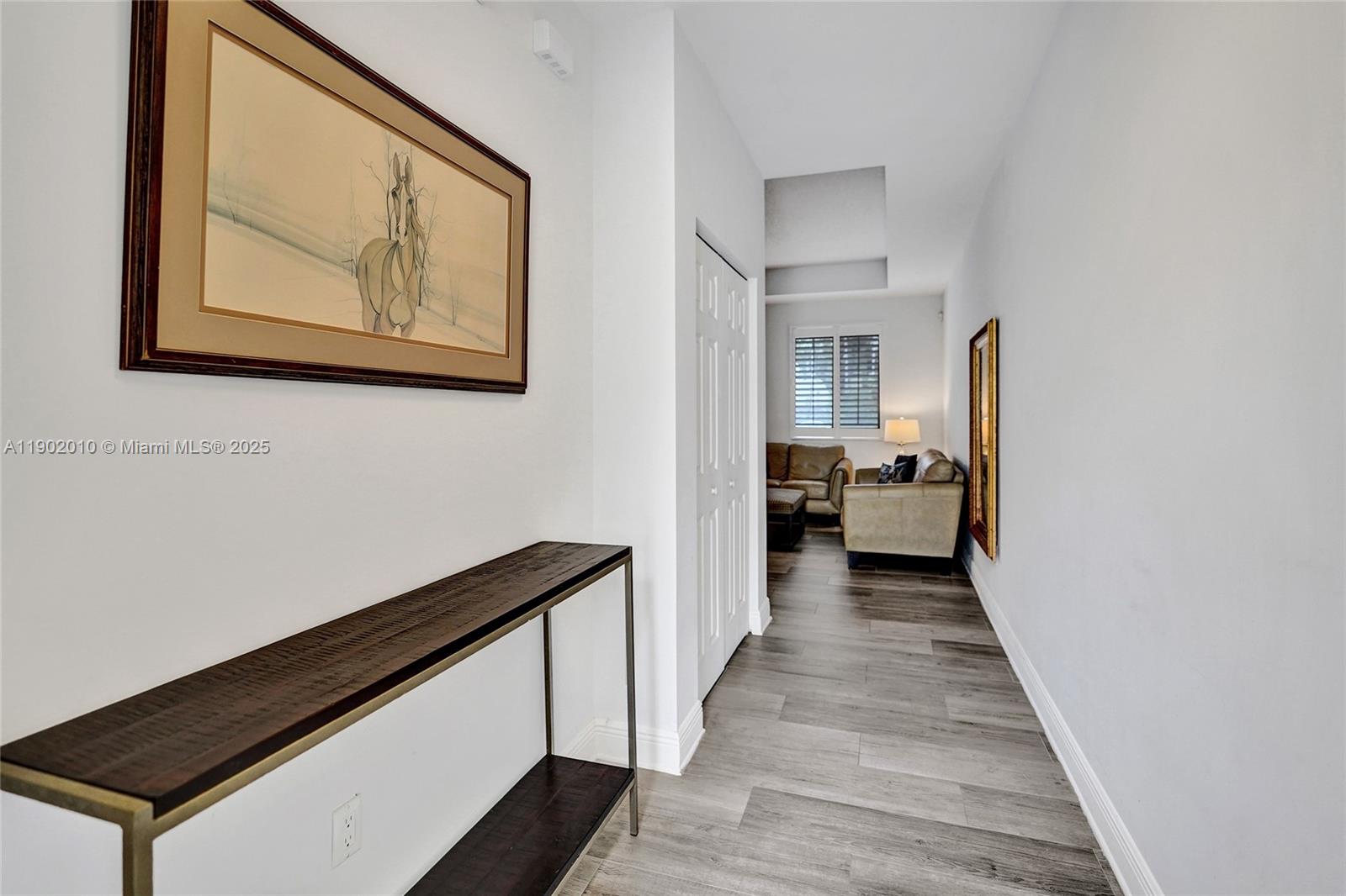 518 North Federal Highway, Unit 14 Lake Worth, FL 33460 - Photo 20 of 54 a view of a hallway with wooden floor and staircase