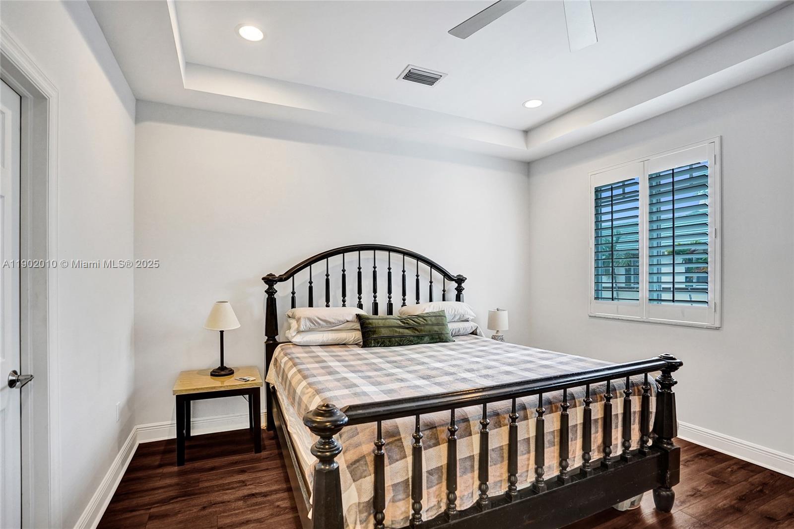 518 North Federal Highway, Unit 14 Lake Worth, FL 33460 - Photo 28 of 54 a bedroom with a bed and a window