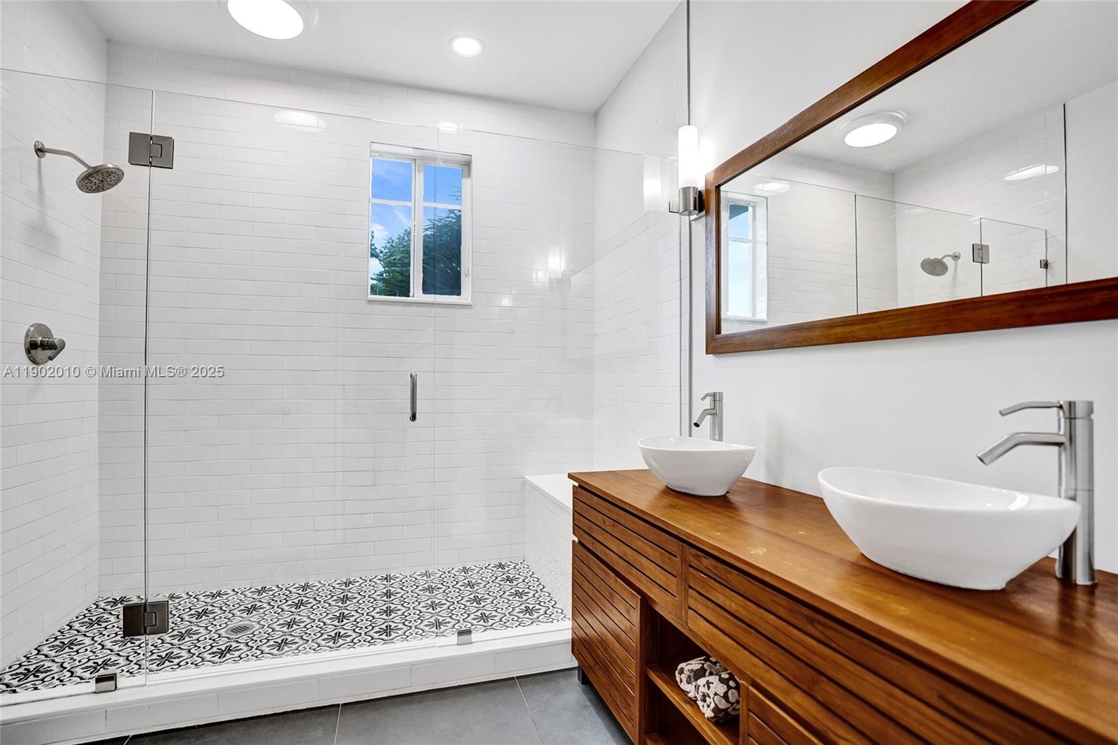 518 North Federal Highway, Unit 14 Lake Worth, FL 33460 - Photo 32 of 54 a bathroom with a sink and a mirror