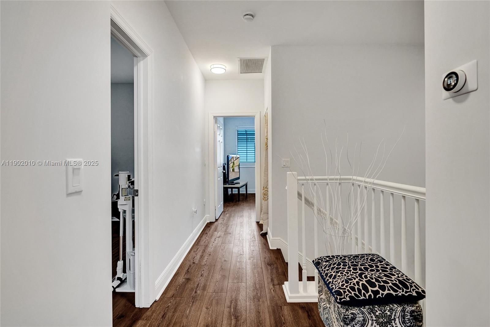 518 North Federal Highway, Unit 14 Lake Worth, FL 33460 - Photo 33 of 54 a view of a hallway with wooden floor and a bathroom