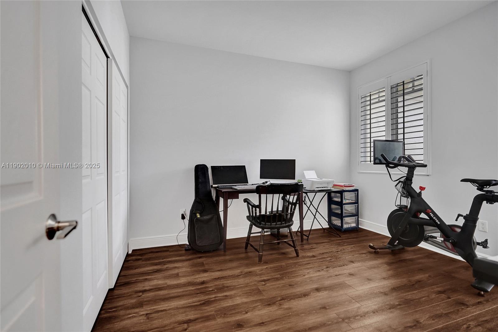 518 North Federal Highway, Unit 14 Lake Worth, FL 33460 - Photo 34 of 54 a view of a workspace with furniture and a window