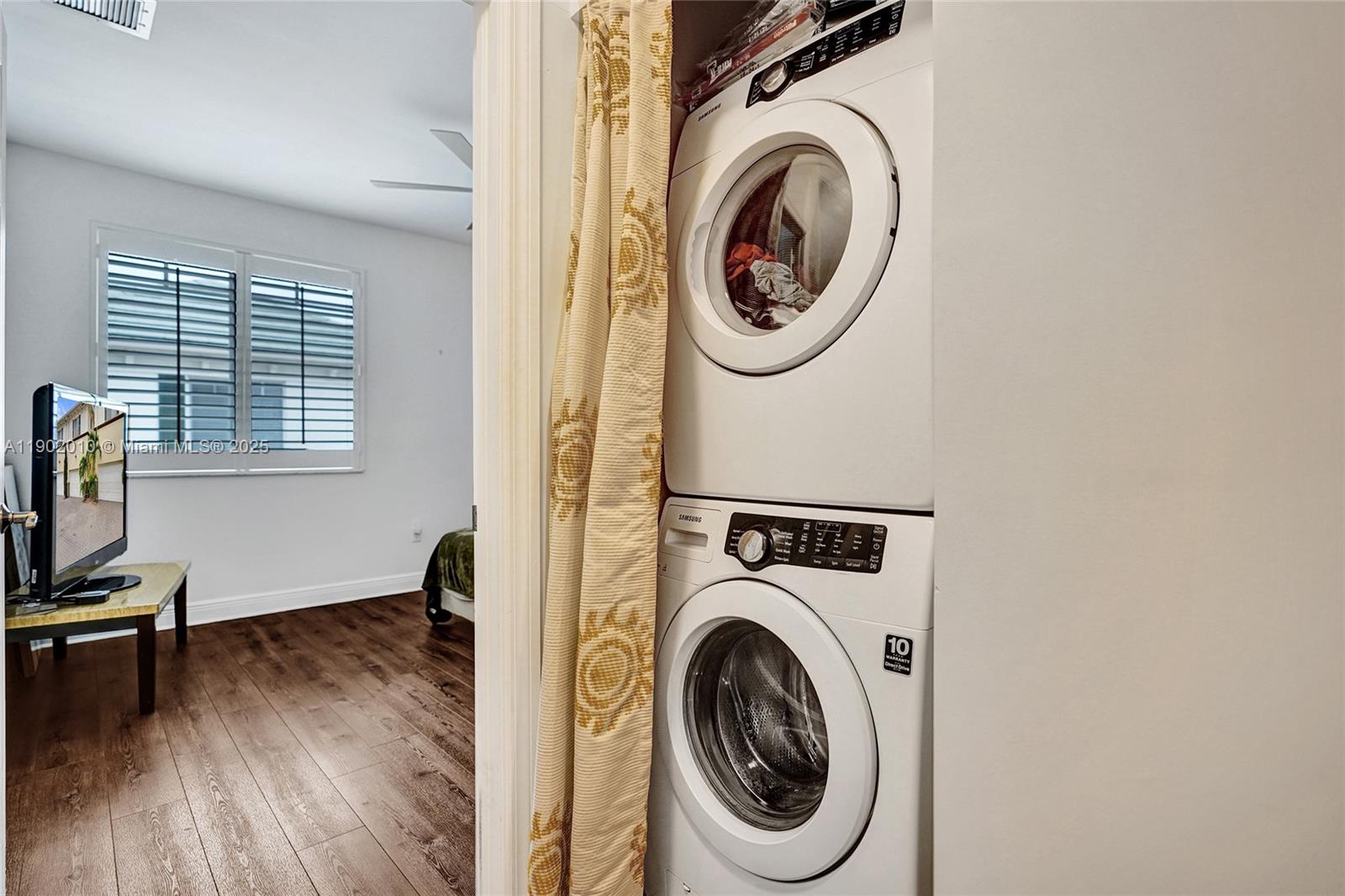 518 North Federal Highway, Unit 14 Lake Worth, FL 33460 - Photo 40 of 54 a view of a bedroom with washer and dryer
