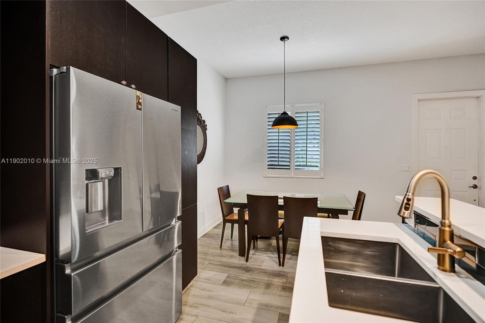 518 North Federal Highway, Unit 14 Lake Worth, FL 33460 - Photo 4 of 54 a kitchen with granite countertop a refrigerator stove and sink