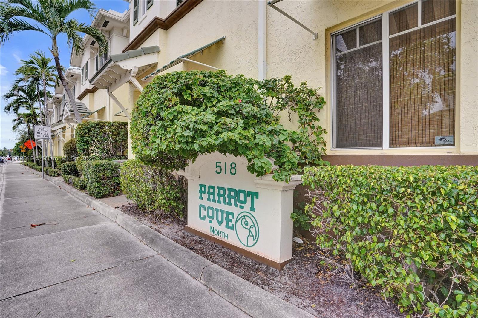 518 North Federal Highway, Unit 14 Lake Worth, FL 33460 - Photo 44 of 54 a sign on the side of a building