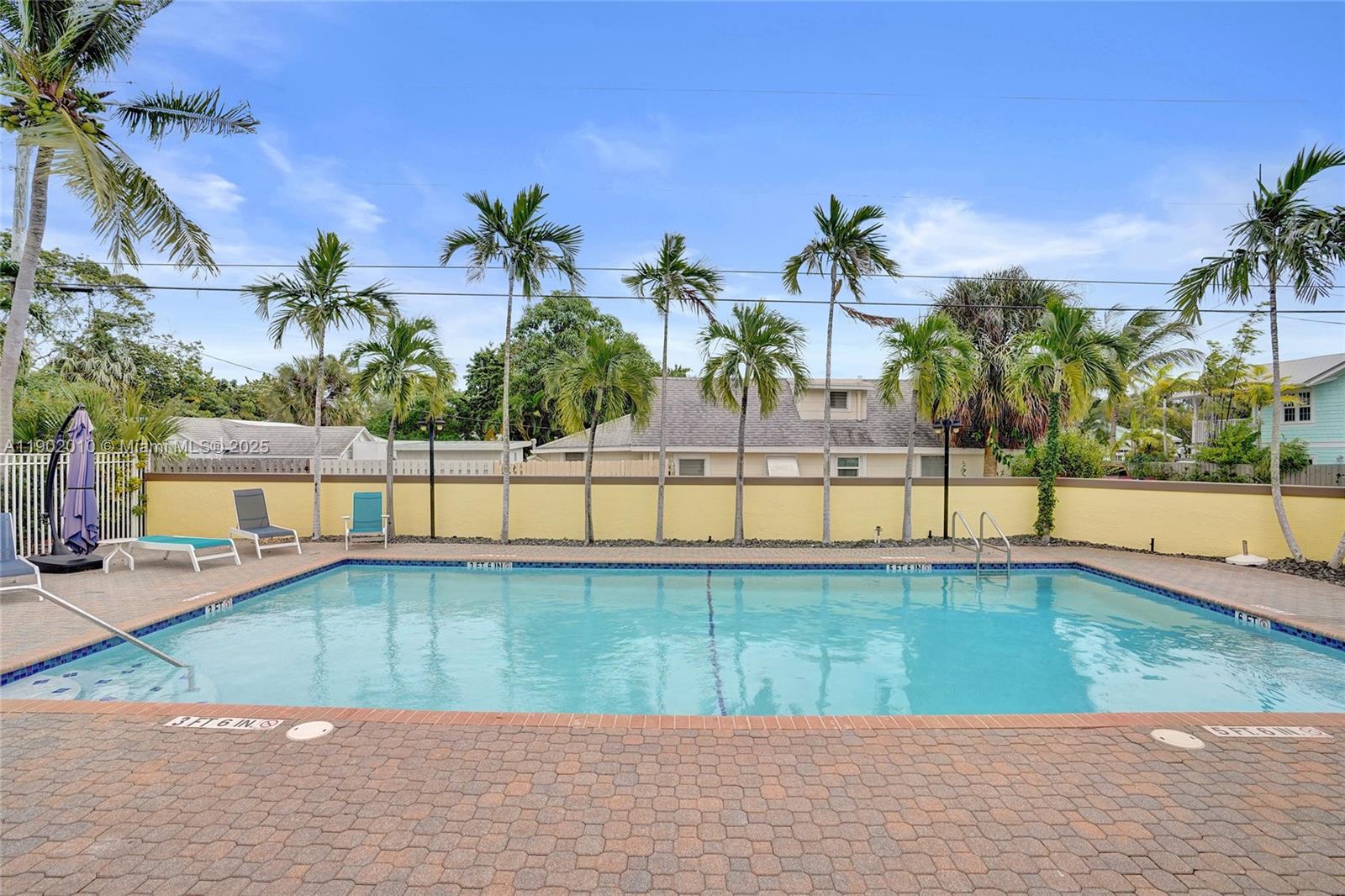 518 North Federal Highway, Unit 14 Lake Worth, FL 33460 - Photo 46 of 54 a view of swimming pool with outdoor seating