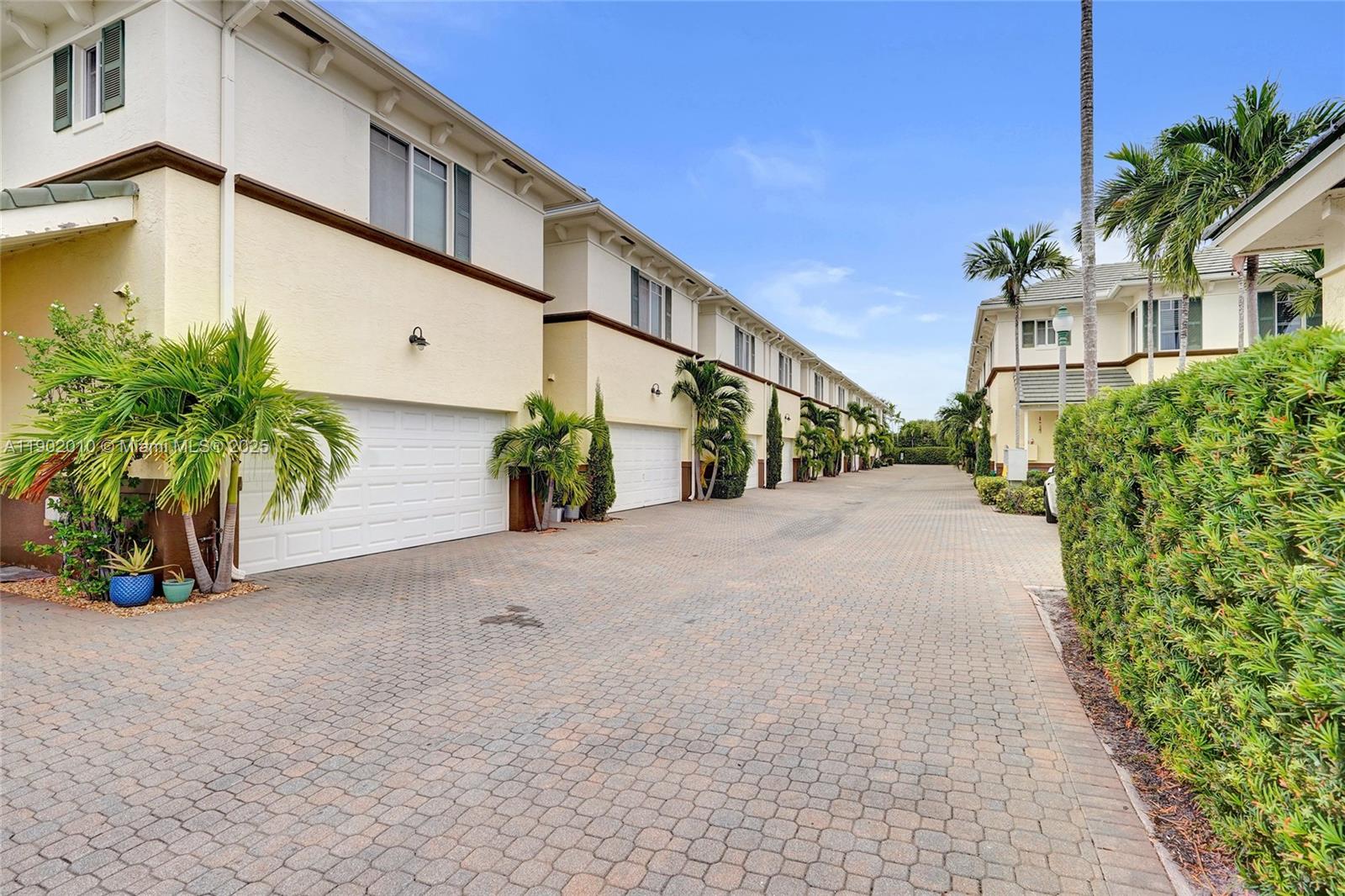 518 North Federal Highway, Unit 14 Lake Worth, FL 33460 - Photo 47 of 54 a view of a street with potted plants