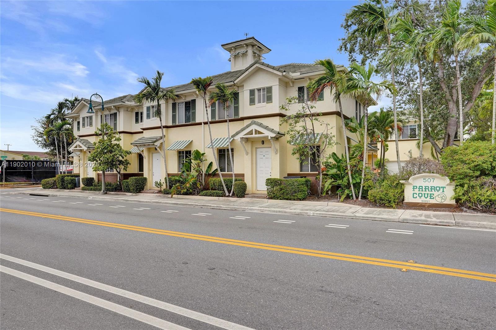 518 North Federal Highway, Unit 14 Lake Worth, FL 33460 - Photo 10 of 54 front view of a house with a street