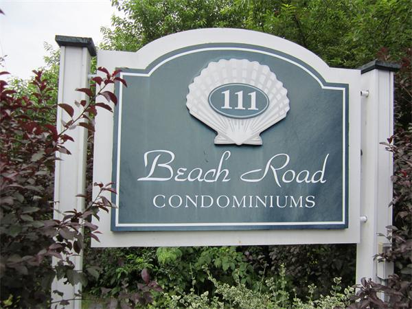 111 Beach Road, Unit 24 Salisbury, MA 01952 - Photo 13 of 13 a sign that is on the side of a building
