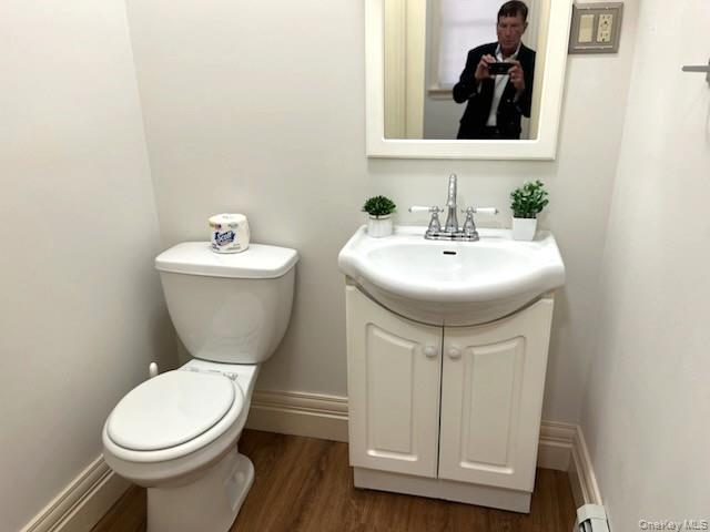 49 Main Street Sparrowbush, NY 12780 - Photo 12 of 21 a bathroom with a toilet sink and mirror