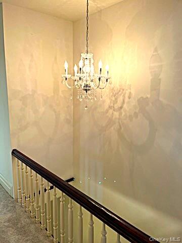 49 Main Street Sparrowbush, NY 12780 - Photo 16 of 21 a view of a room with wooden floor and stairs