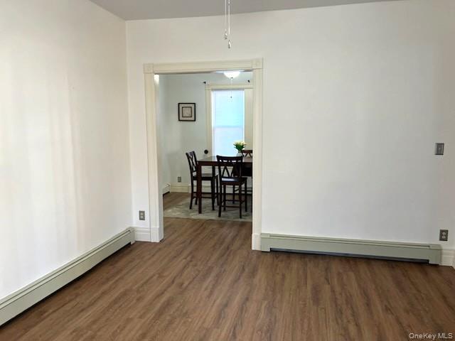 49 Main Street Sparrowbush, NY 12780 - Photo 6 of 21 a view of a room with wooden floor table and chairs