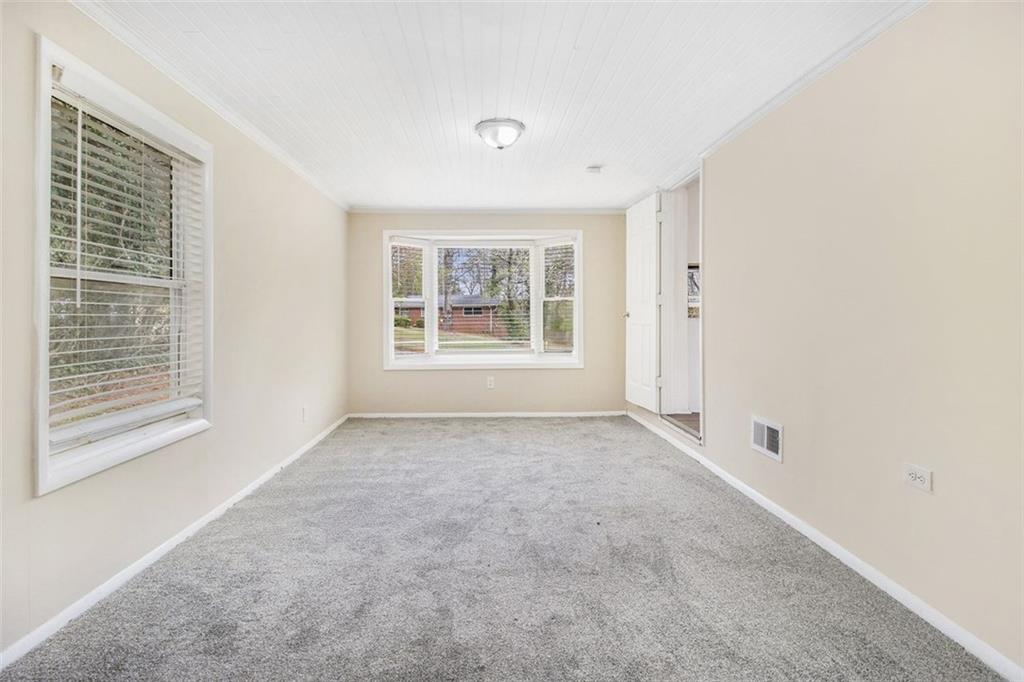 3409 Glensford Drive Decatur, GA 30032 - Photo 12 of 15 a view of an empty room with a window