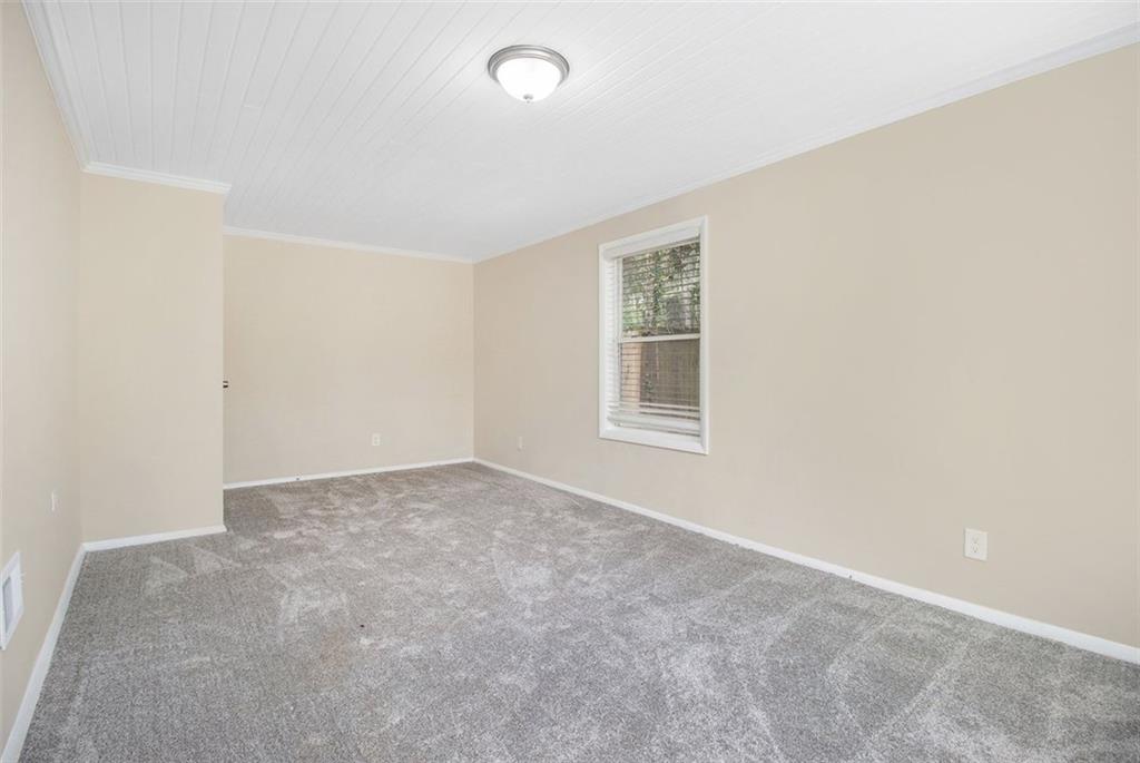 3409 Glensford Drive Decatur, GA 30032 - Photo 13 of 15 an empty room with windows