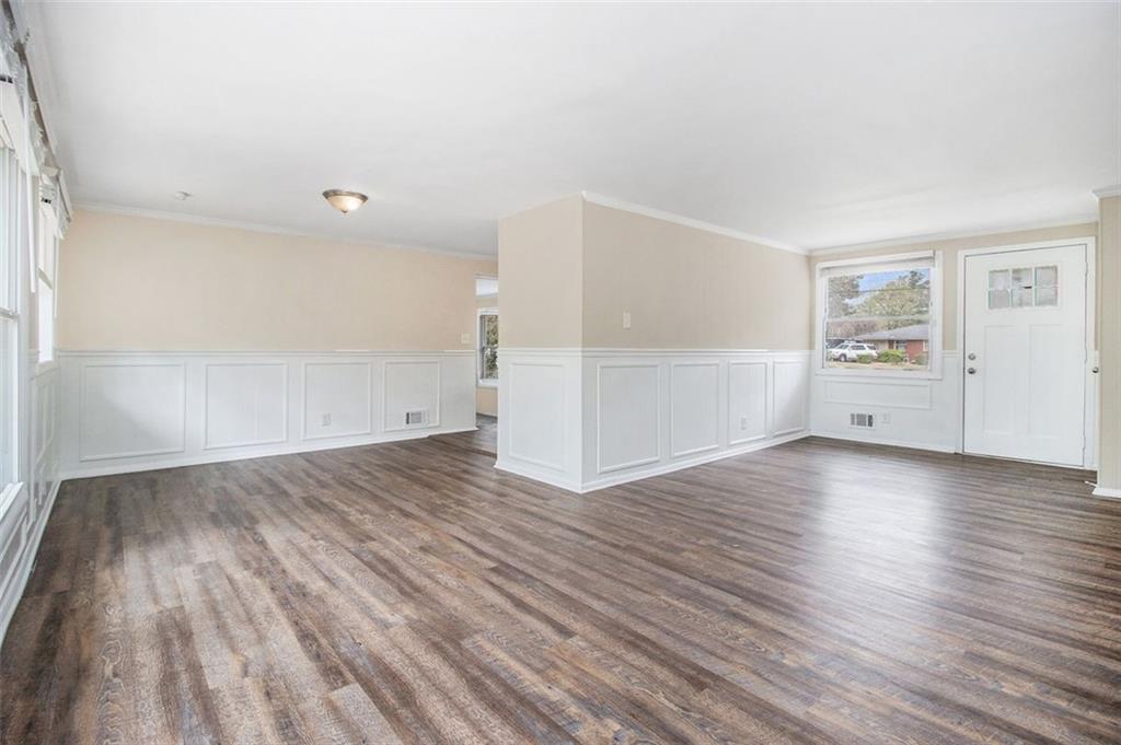 3409 Glensford Drive Decatur, GA 30032 - Photo 2 of 15 wooden floor in an empty room with a window