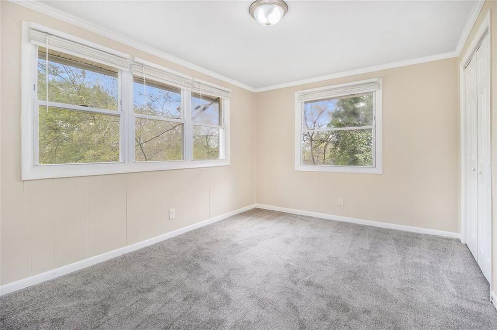 3409 Glensford Drive Decatur, GA 30032 - Photo 10 of 15 an empty room with a window
