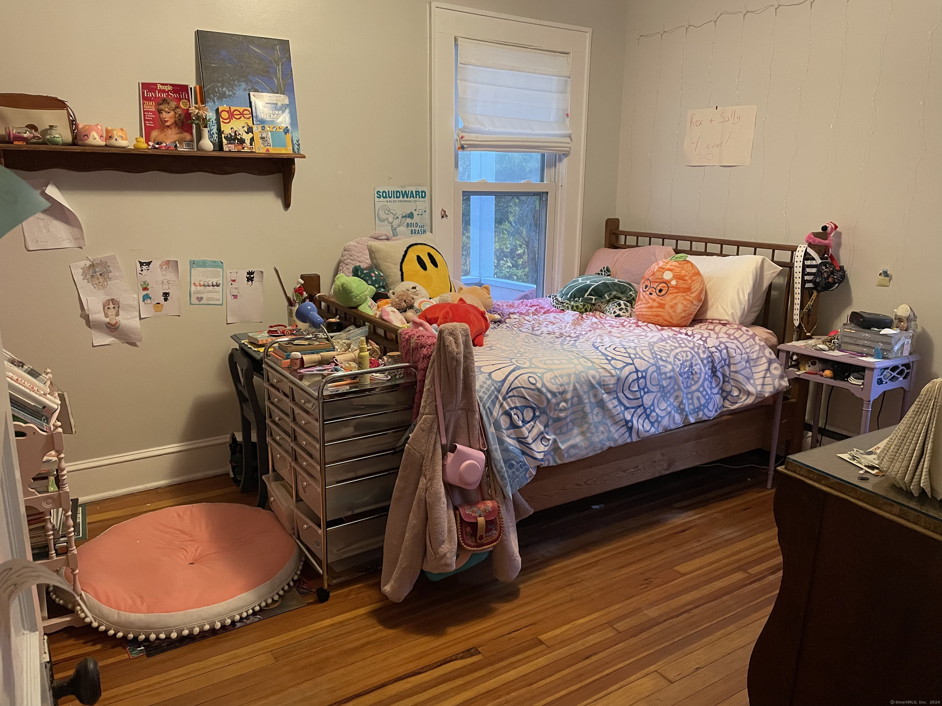 193-195 Wolcott Hill Road Wethersfield, CT 06109 - Photo 14 of 29 a bedroom with a bed and wooden floor