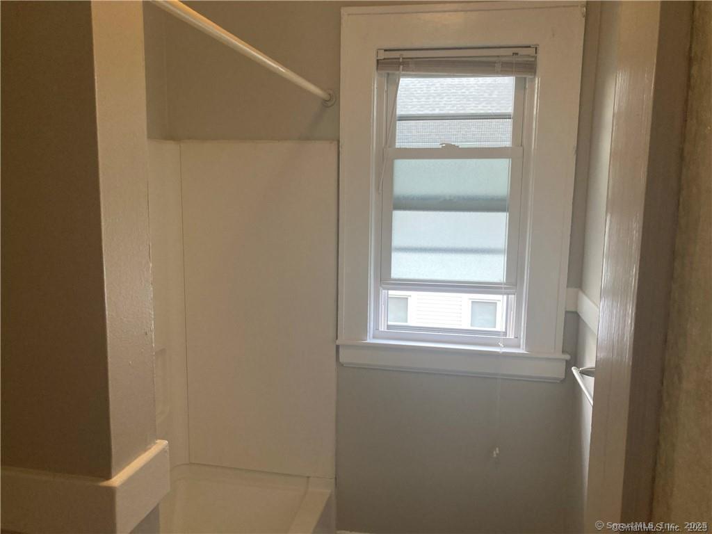 193-195 Wolcott Hill Road Wethersfield, CT 06109 - Photo 23 of 29 a room that has a window in it