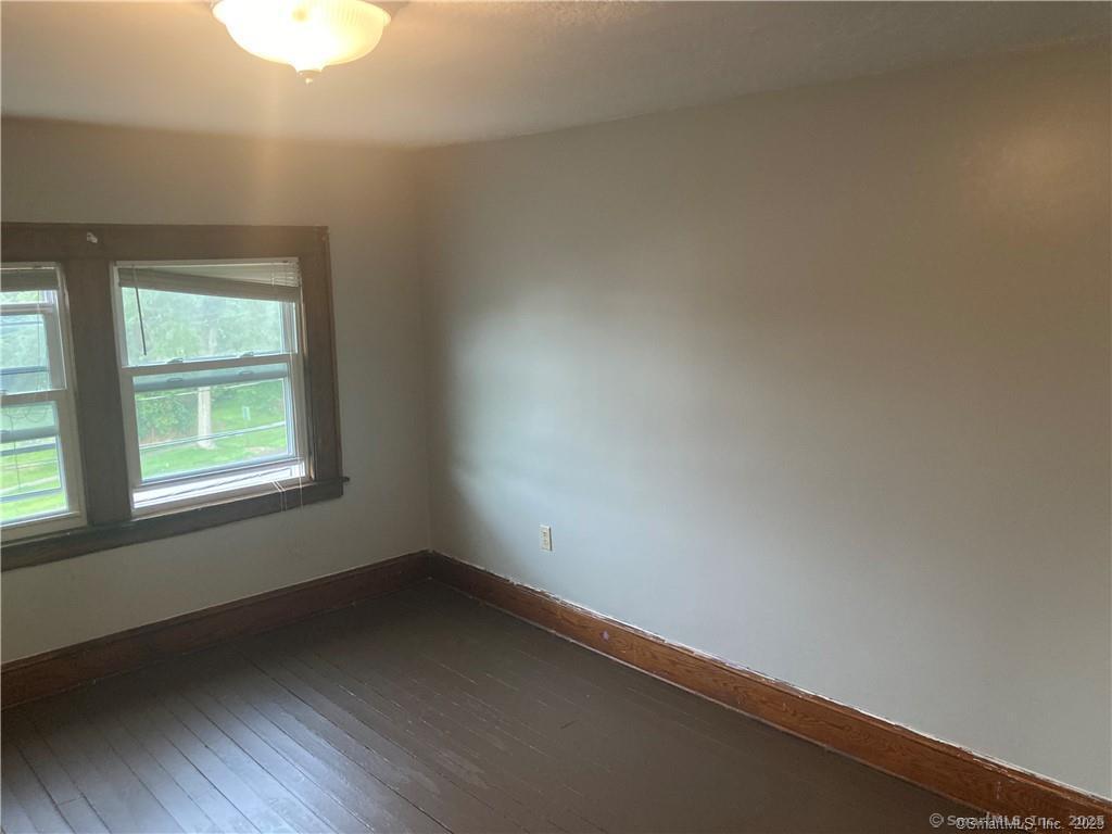 193-195 Wolcott Hill Road Wethersfield, CT 06109 - Photo 26 of 29 an empty room with a window