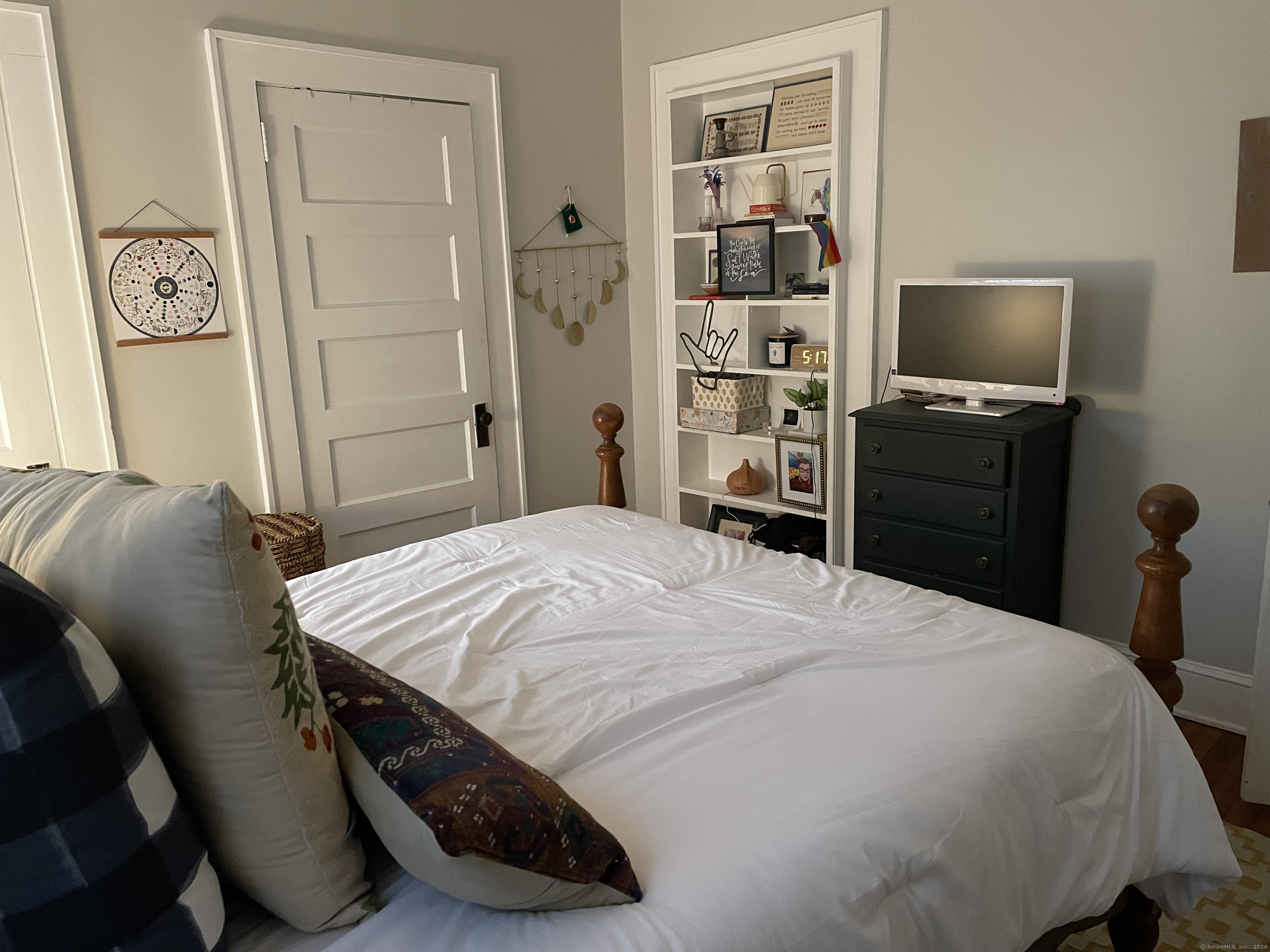 193-195 Wolcott Hill Road Wethersfield, CT 06109 - Photo 10 of 29 a bedroom with a bed and a television