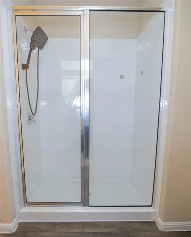 a bathroom with a toilet sink and a mirror