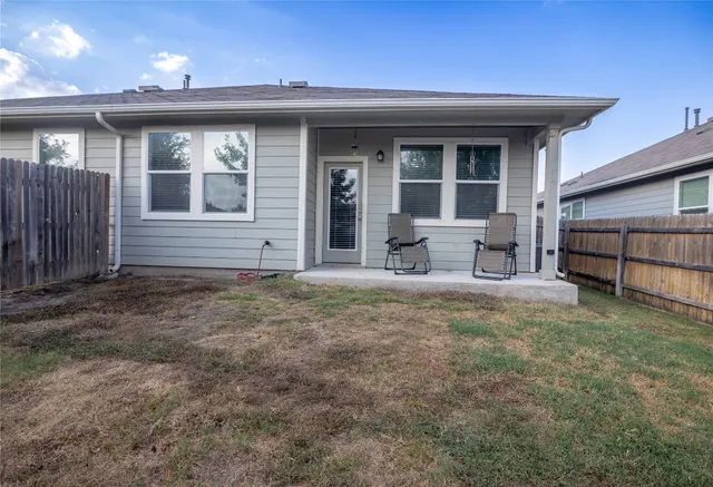 a workspace with furniture and a window