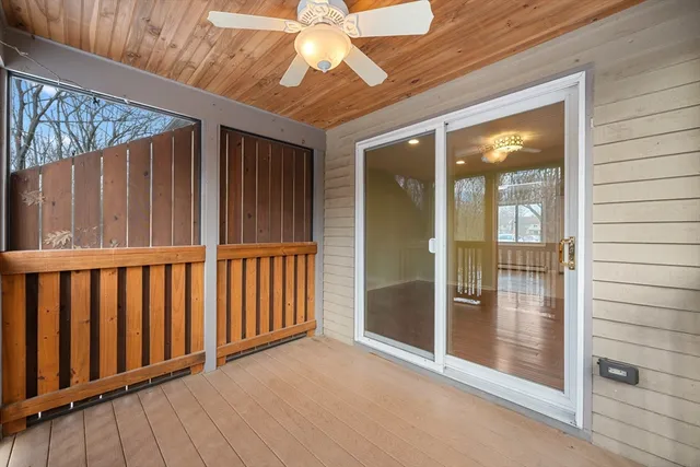 a view of wooden balcony with wooden floor