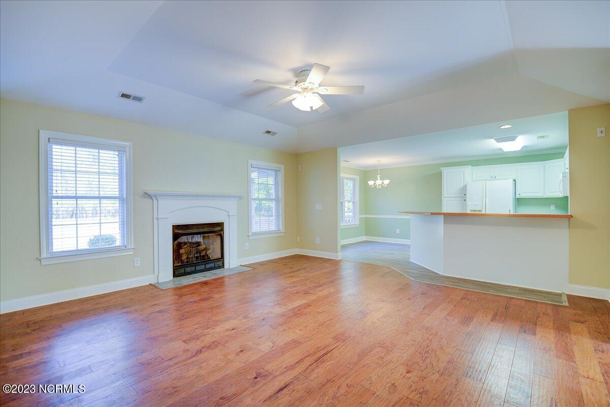 442 Neuchatel Road New Bern, NC 28562 - Photo 15 of 41 Open living room to the kitchen