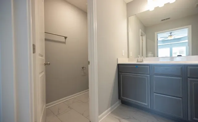 a bathroom with a sink and a toilet