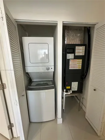 a utility room with a washer and dryer