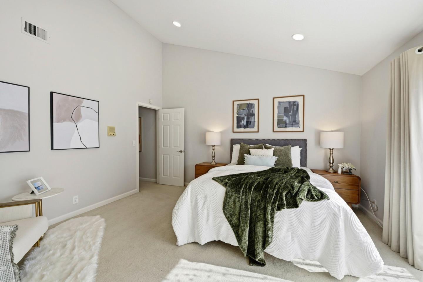 751 West Middlefield Road, Unit C Mountain View, CA 94043 - Photo 19 of 27 a bedroom with a bed and a painting on the wall