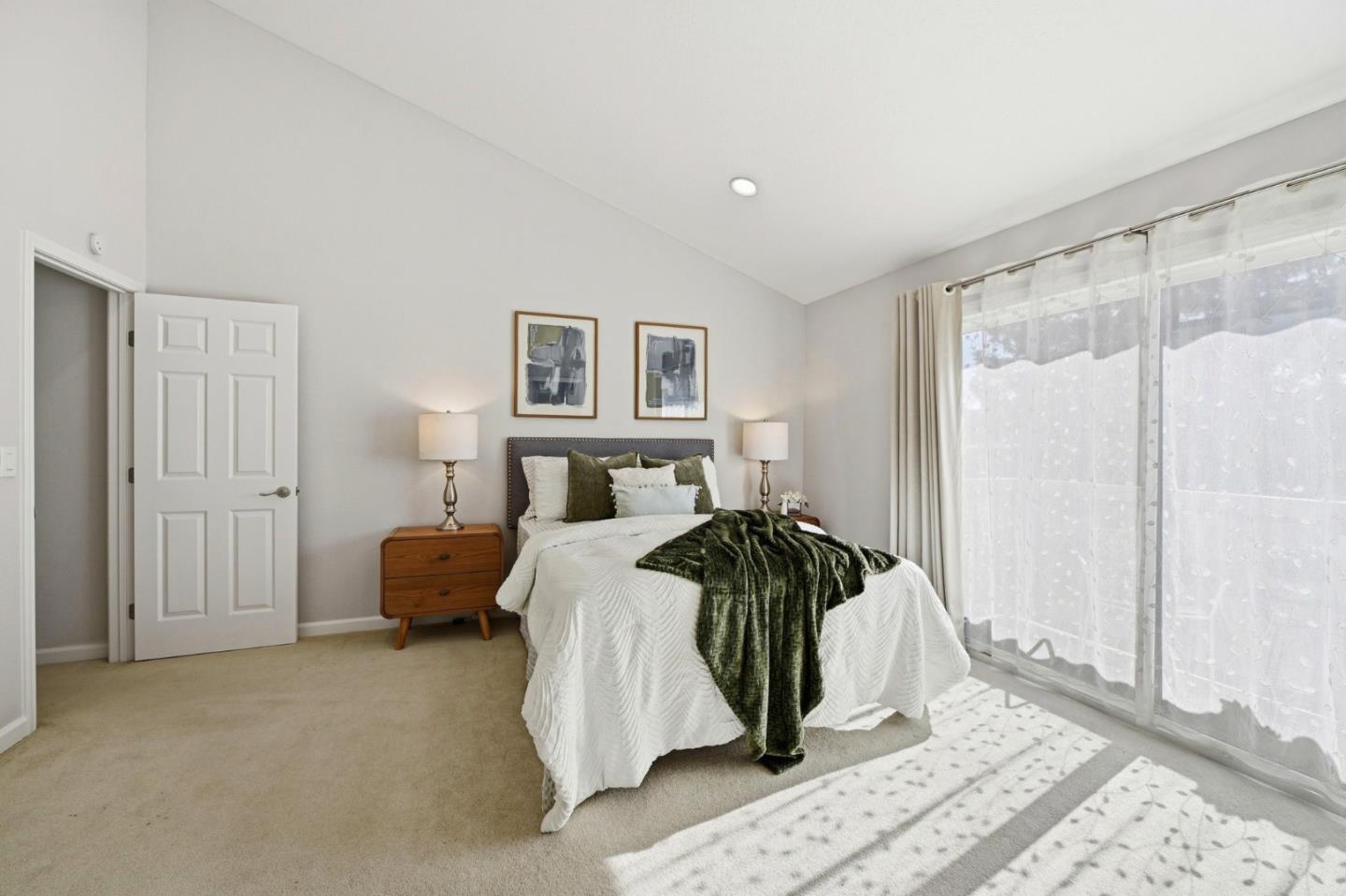 751 West Middlefield Road, Unit C Mountain View, CA 94043 - Photo 20 of 27 a bedroom with a bed and a window