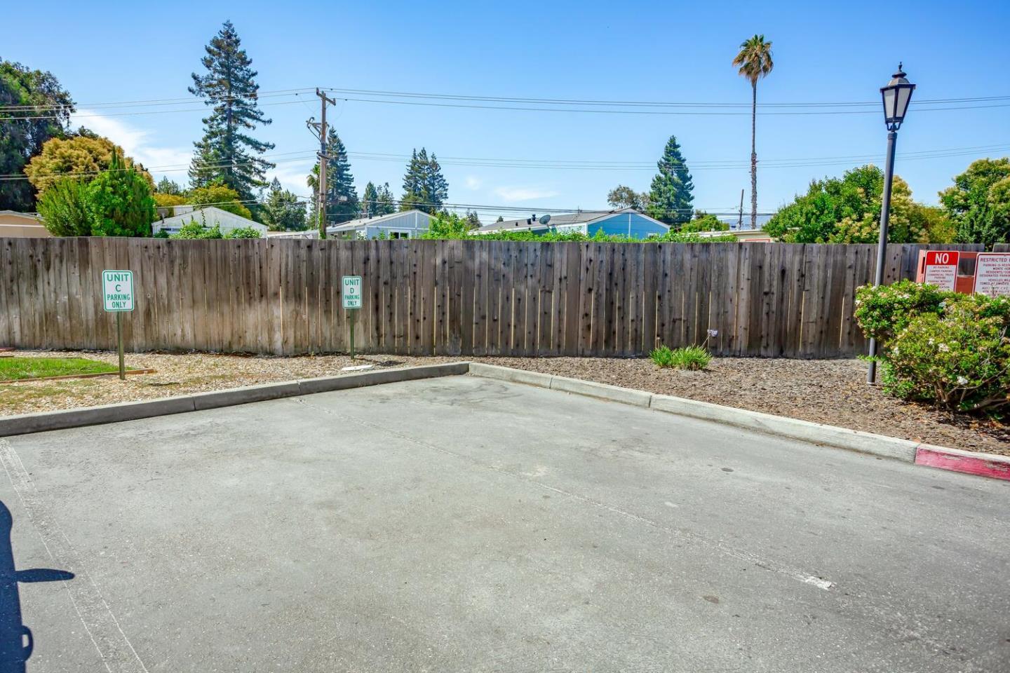 751 West Middlefield Road, Unit C Mountain View, CA 94043 - Photo 25 of 27 a backyard of a house with lots of green space