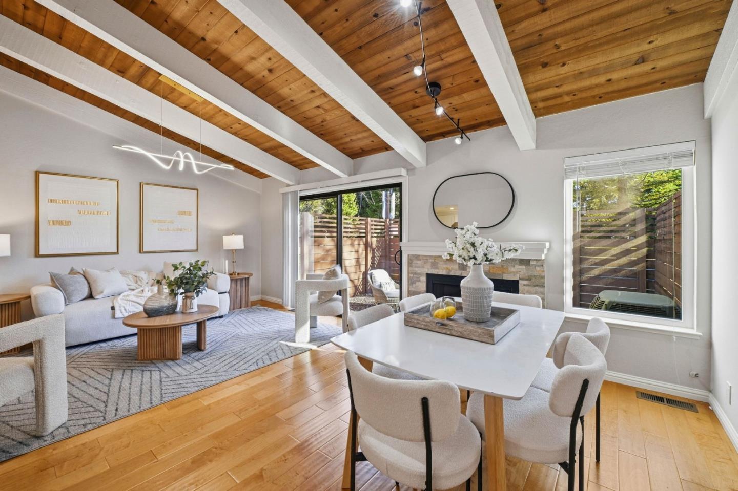 751 West Middlefield Road, Unit C Mountain View, CA 94043 - Photo 6 of 27 a view of a dining room with furniture window and wooden floor