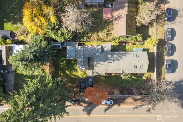 an aerial view of residential building with parking space