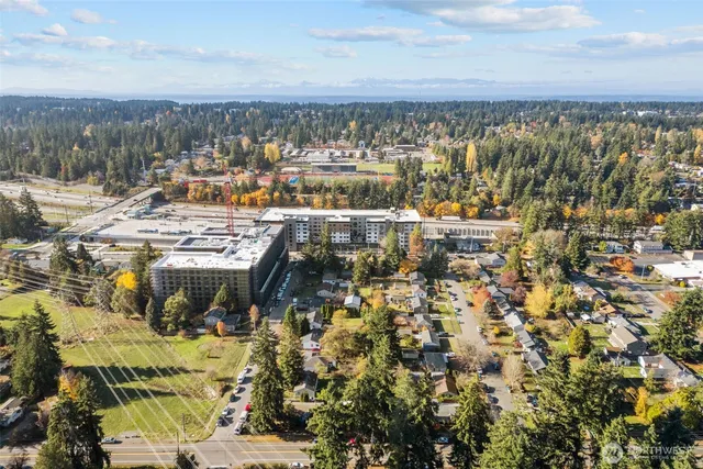 an aerial view of residential building with parking space