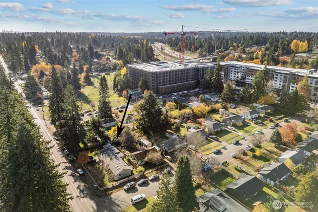 an aerial view of residential building with parking space