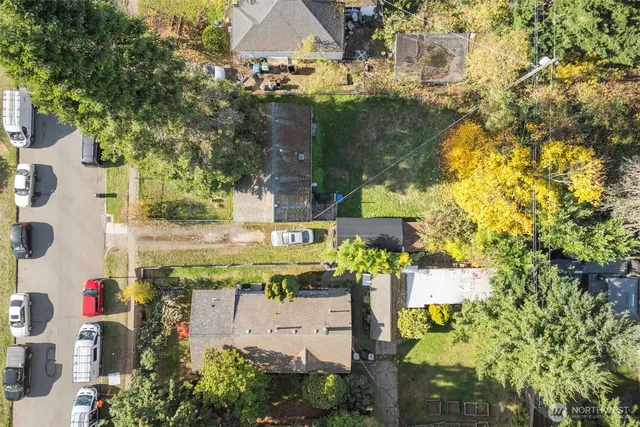 an aerial view of waterside residential houses with outdoor space