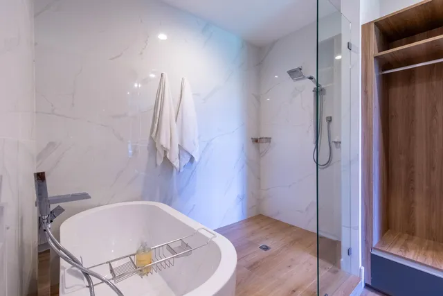 a bathroom with a sink and shower