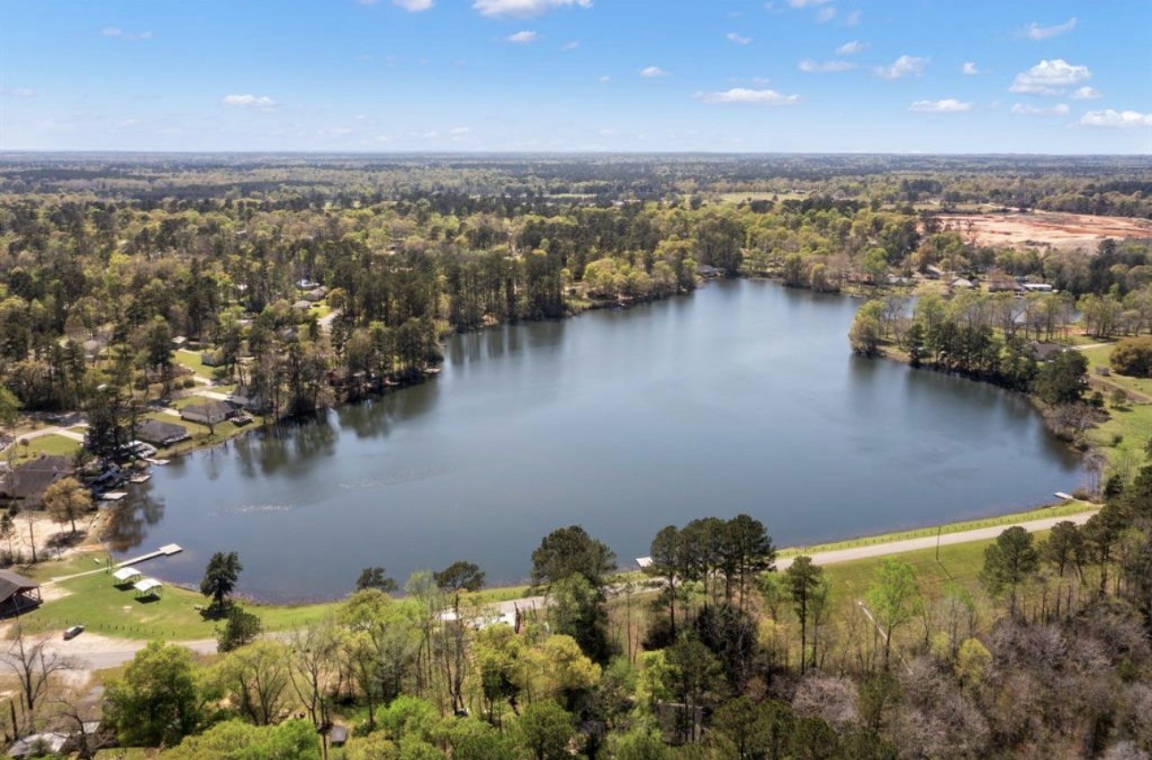 Tbd Royal Estates Drive Conroe, TX 77303 - Photo 4 of 4 a view of a lake
