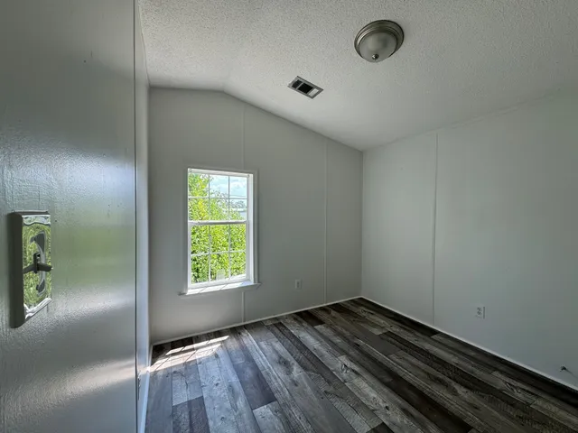 an empty room with window