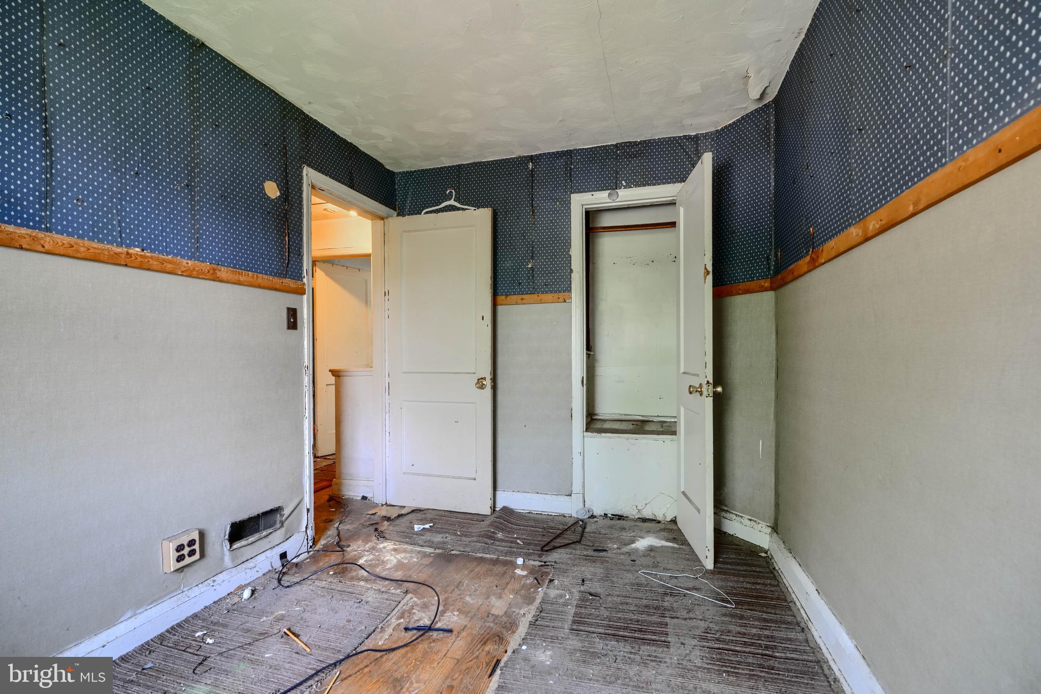 2837 Round Road Baltimore, MD 21225 - Photo 11 of 18 a view of a hallway with wooden floor