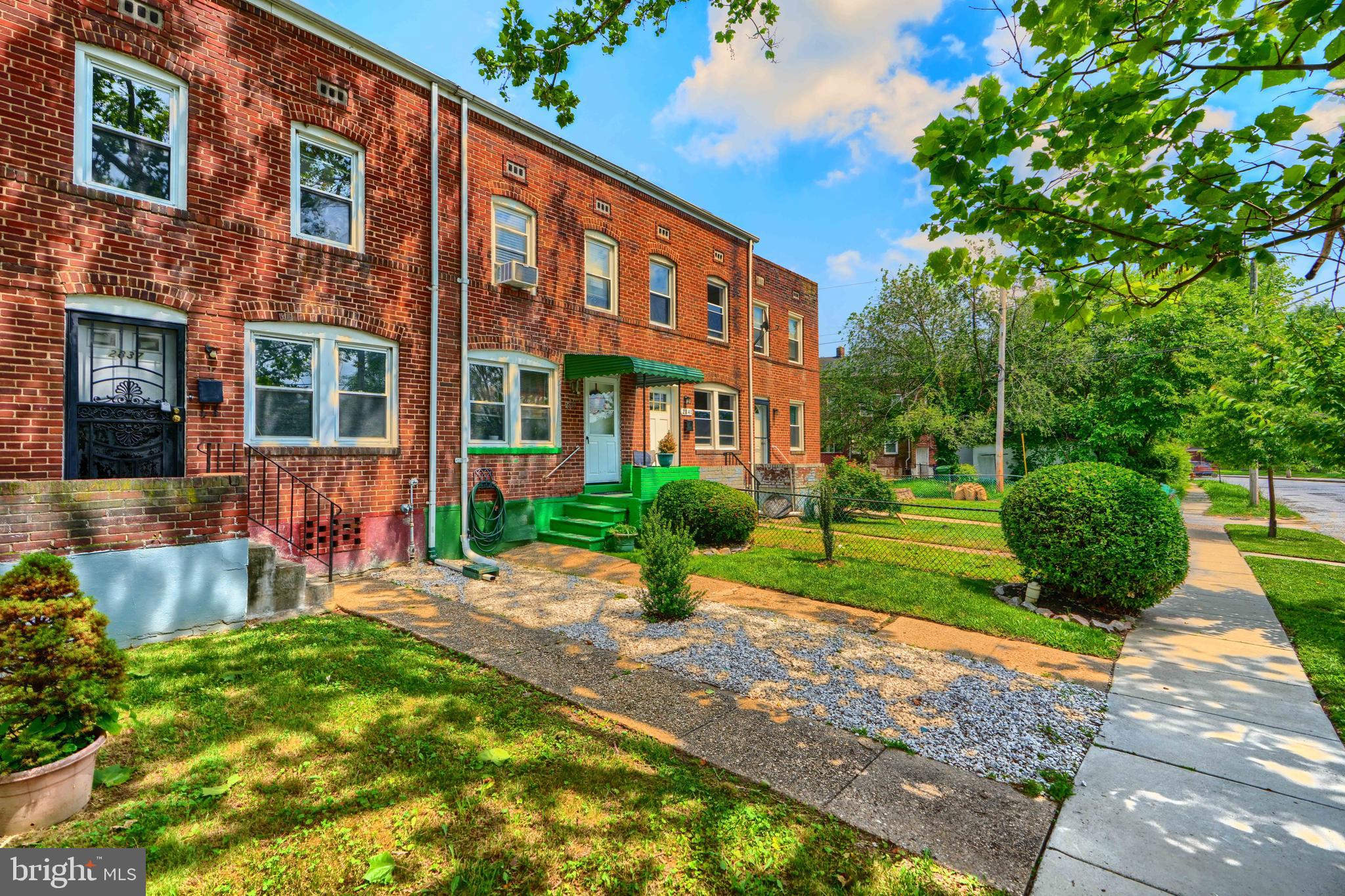 2837 Round Road Baltimore, MD 21225 - Photo 2 of 18 a view of a patio with a table and chairs and plants